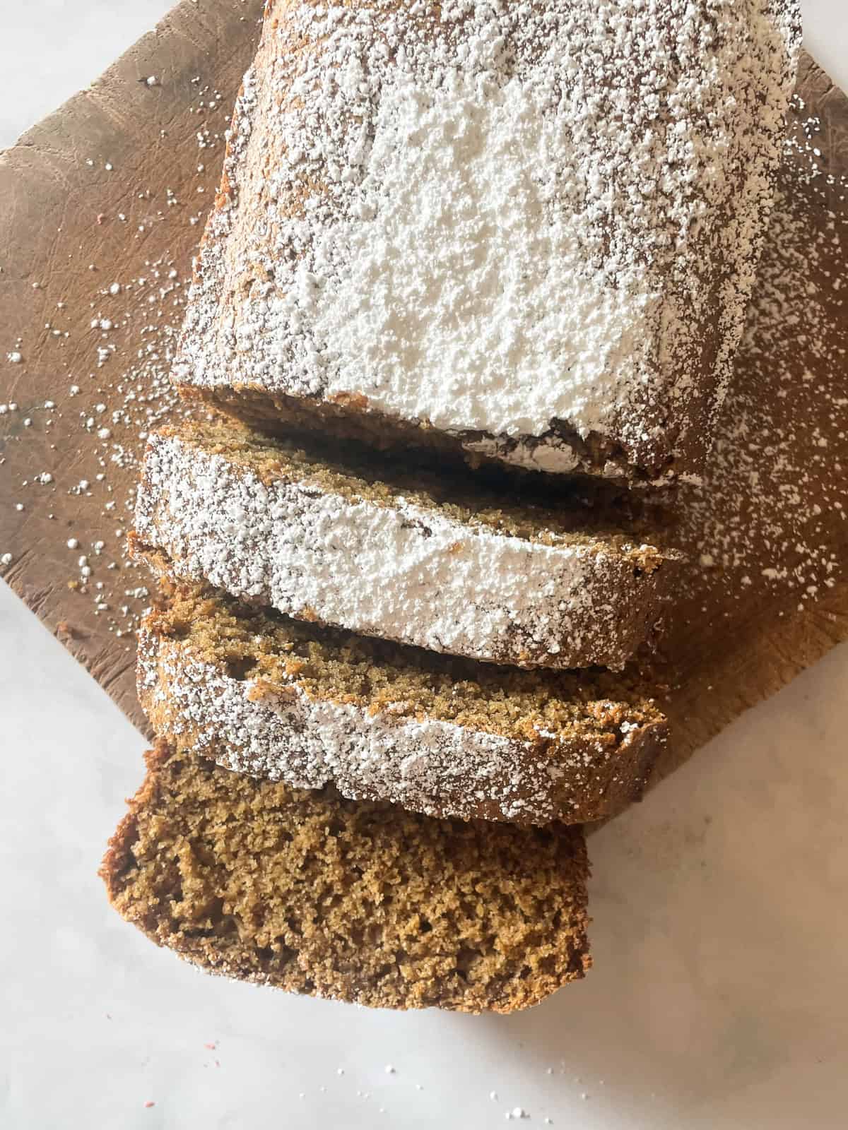 A gingerbread loaf cut into slices.