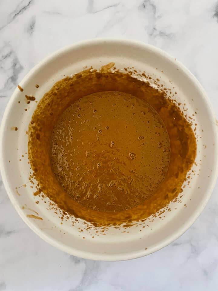 Gluten free gingerbread batter in a bowl.