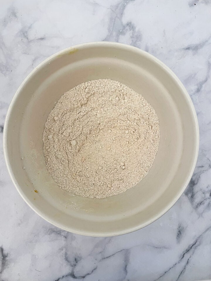 Dry mix for cranberry muffins in a bowl.