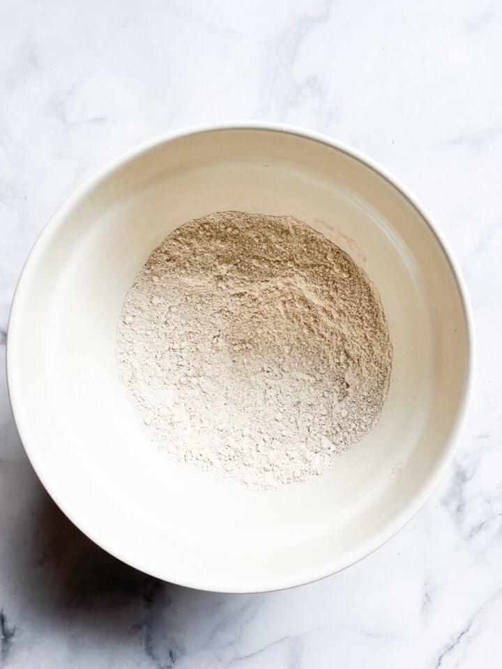 Dry mix for persimmon muffins in a bowl.