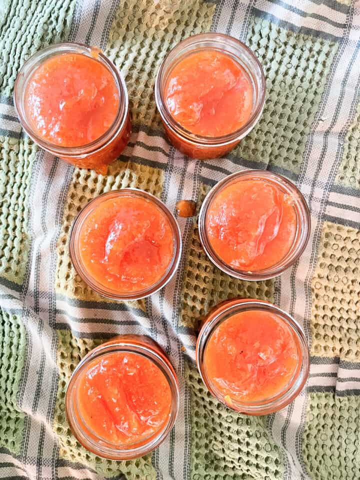 Persimmon jam in jars with no lids.