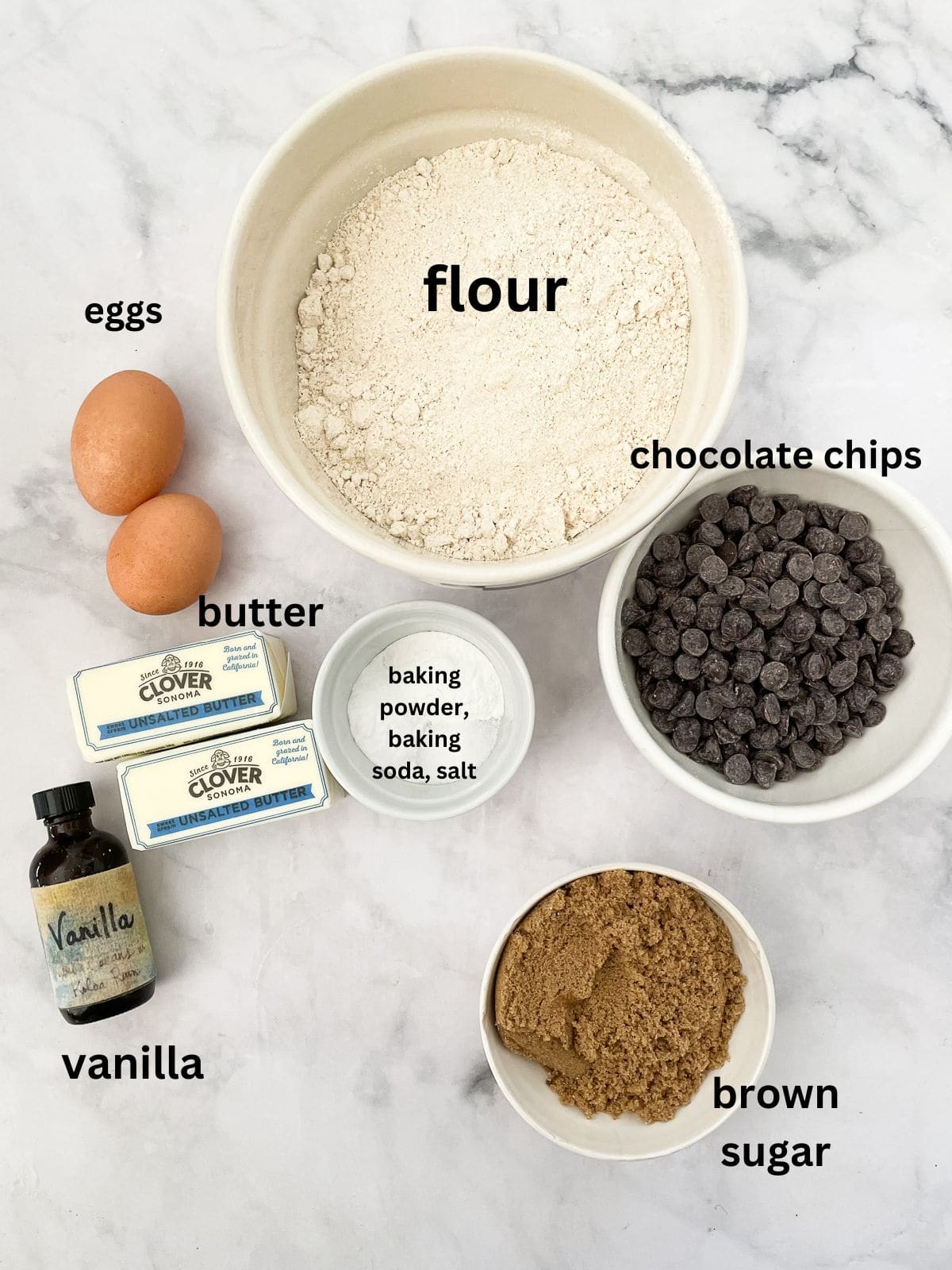 Ingredients for low sugar chocolate chip cookies are portioned out and text-labeled.