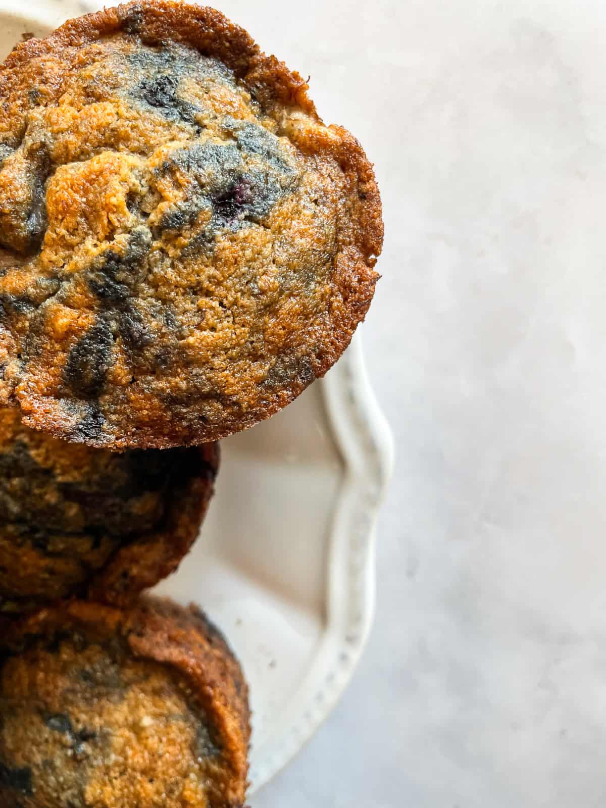 Blackberries are seen in a banana blackberry muffins.