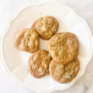 Oat flour chocolate chip cookies on a white plate.