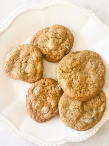 Oat flour chocolate chip cookies on a white plate.