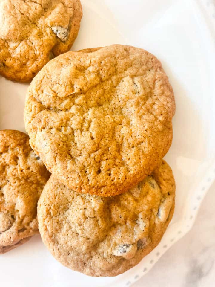 Oat flour chocolate chip cookies on a white plate.