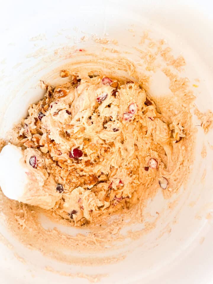 Cranberries and walnuts are stirred into loaf batter.