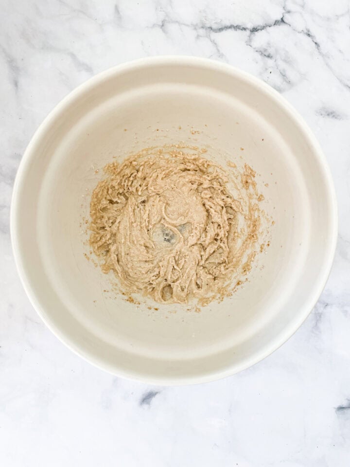 Butter, sugar, and oil creamed in bowl.