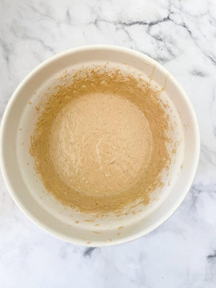 Gluten free donut muffins batter in a bowl.