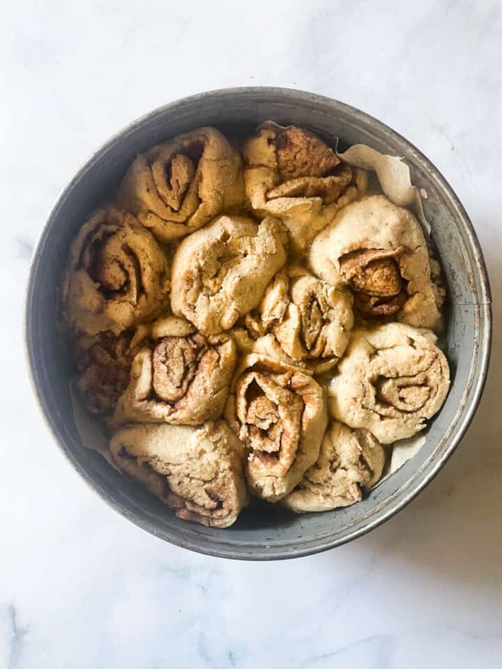 Proofed oat flour cinnamon rolls before baking.