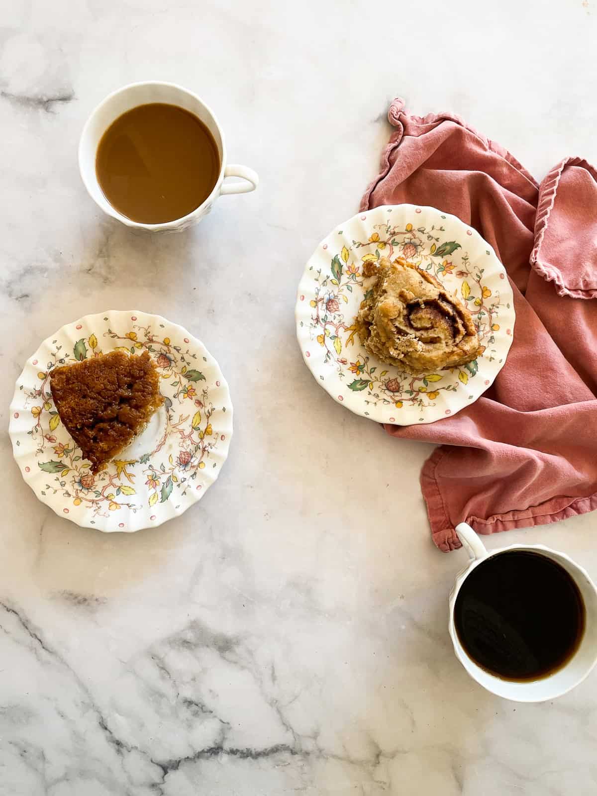 Cups of coffee and oat flour cinnamon rolls.