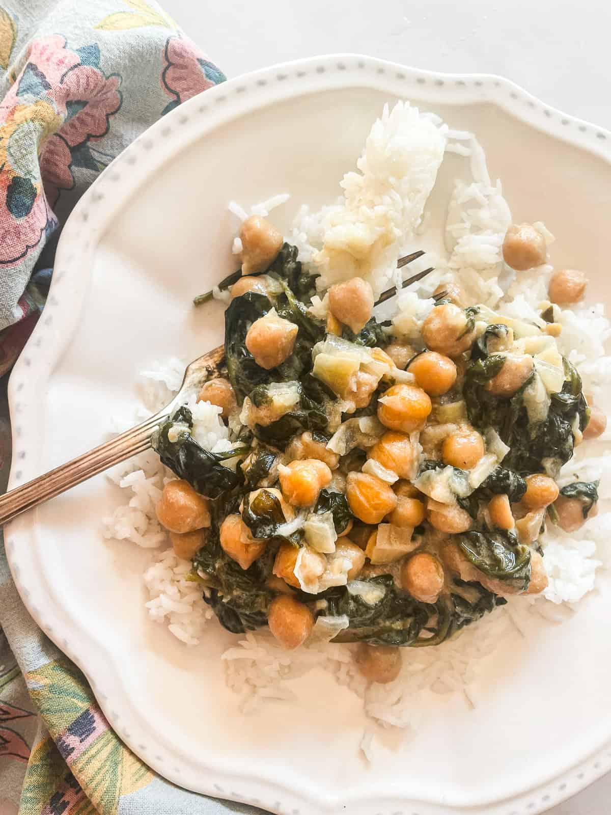 A plate of curried chickpeas with coconut milk.