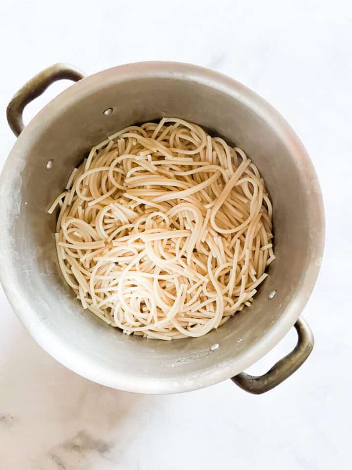 A pot of cooked gluten free pasta.