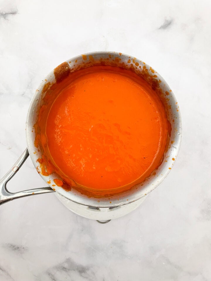 Vegetarian cream of tomato soup in a pot.