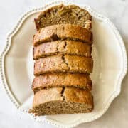 Slices of banana nut bread on a plate.