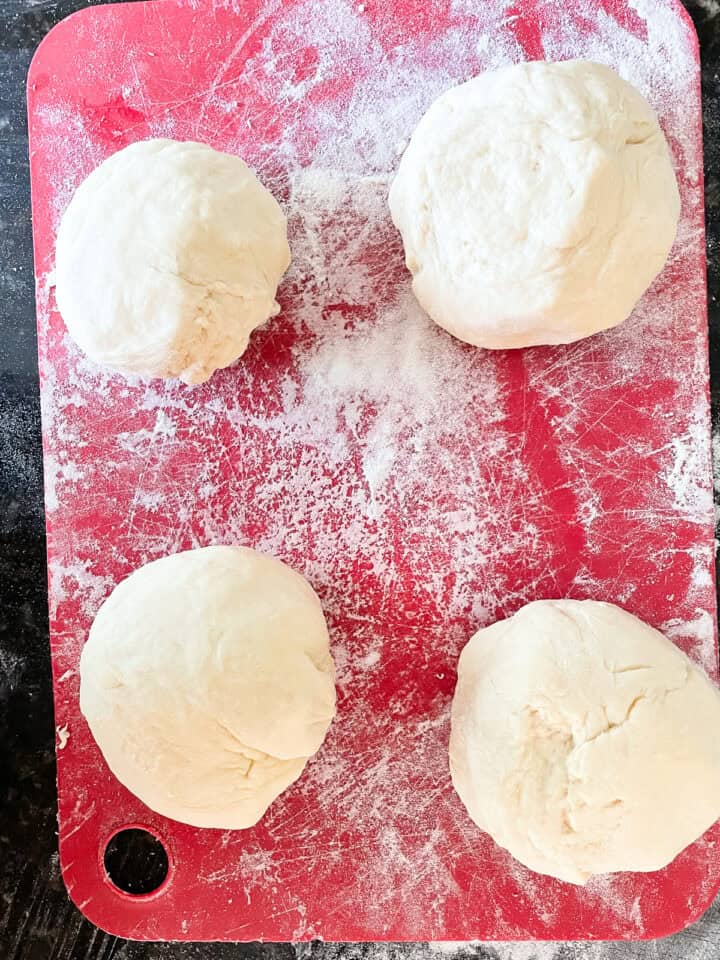 Dough is divided into 4 pieces.