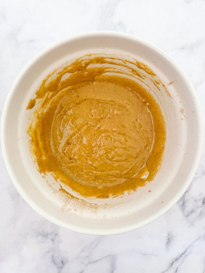 Carrot cake cupcakes batter in a bowl.