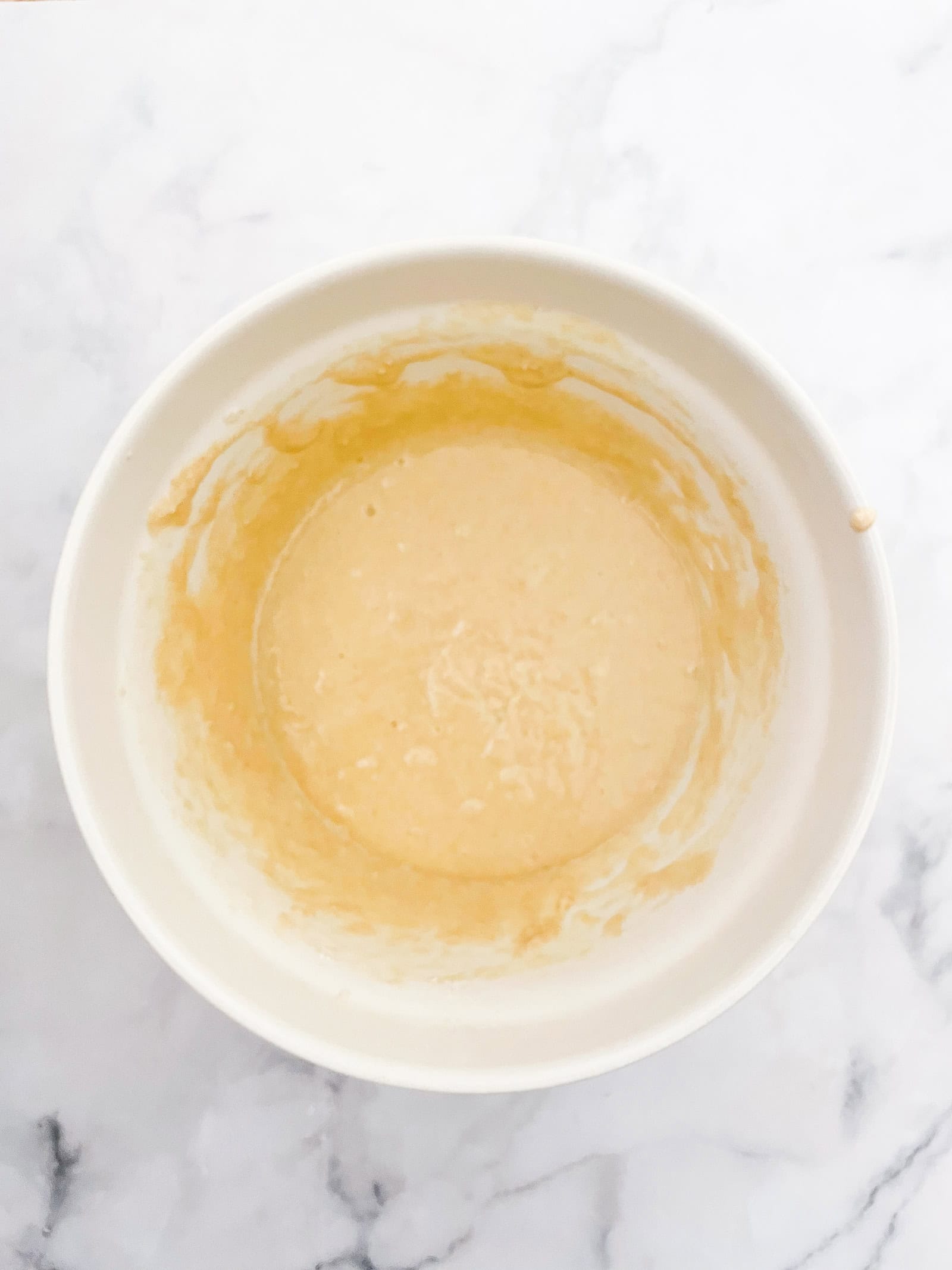 Tender and wholesome gluten free rhubarb muffins make great use of seasonal rhubarb. Oat and almond flours star in this easy recipe. Gluten free rhubarb muffins batter in a bowl.