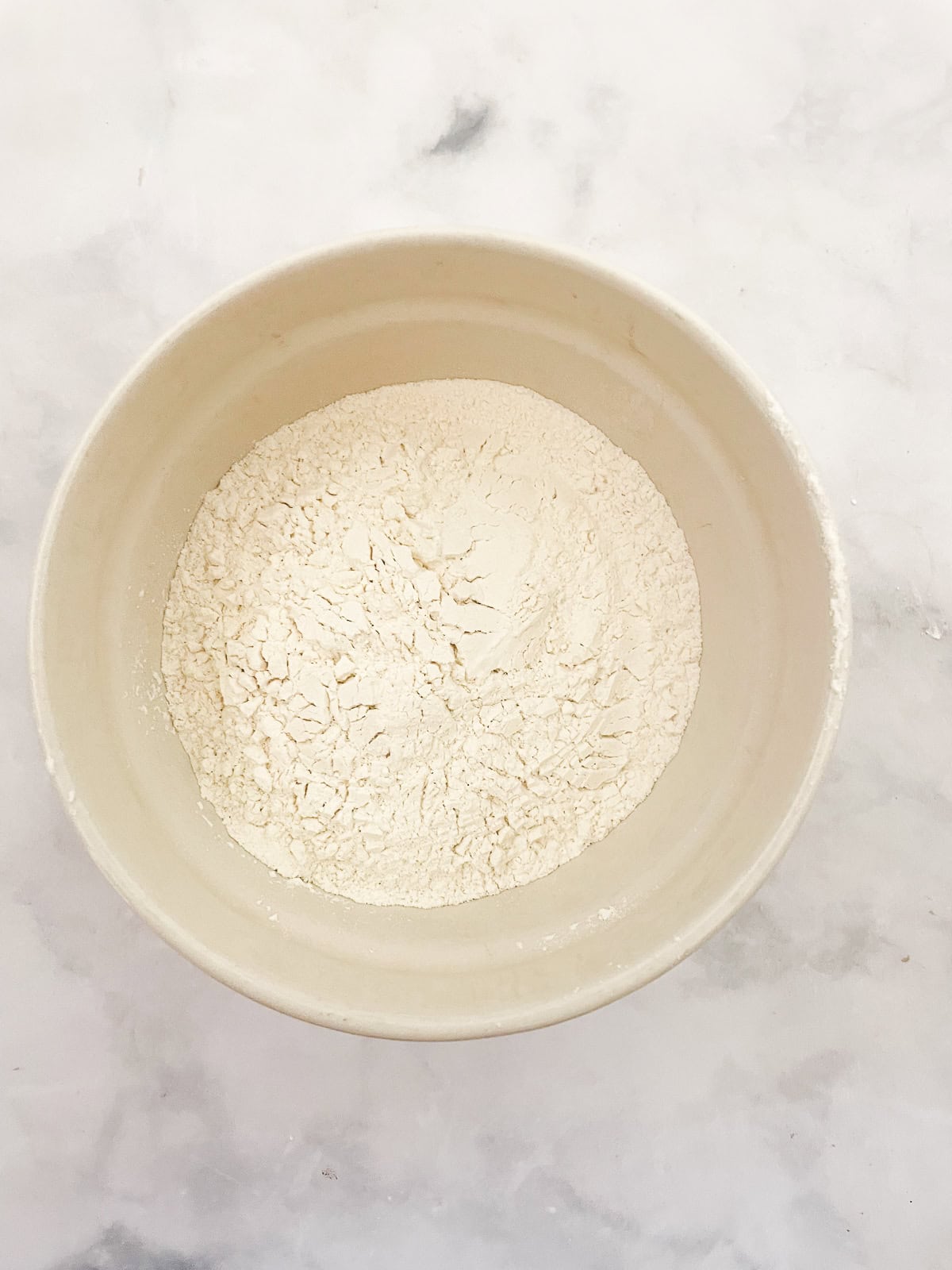 The dry mix for vanilla buttermilk cake in a bowl.