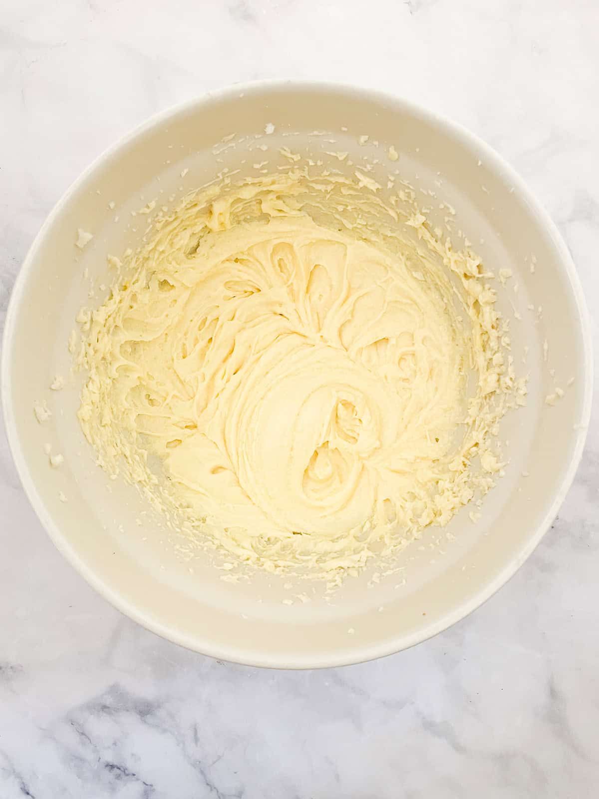 Eggs are added to cake batter.