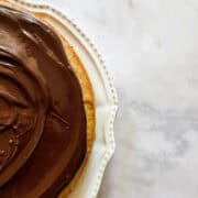 Chocolate icing on a cake.