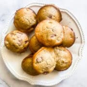 A plate of gluten free strawberry rhubarb muffins.