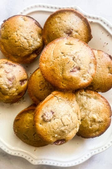 A plate of gluten free strawberry rhubarb muffins.