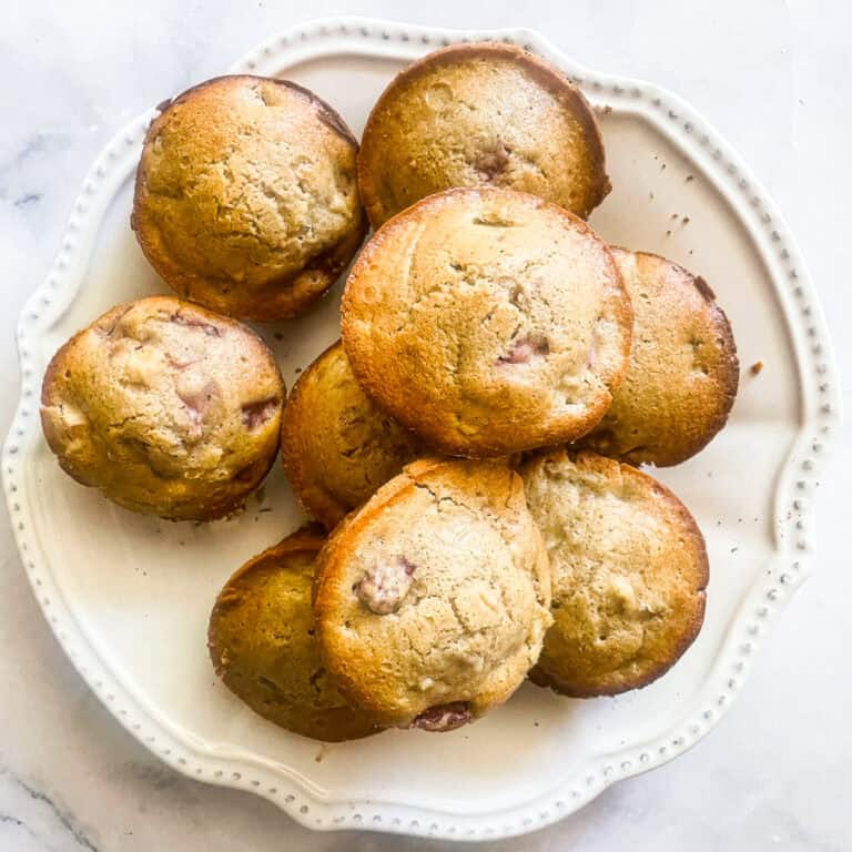 A plate of gluten free strawberry rhubarb muffins.