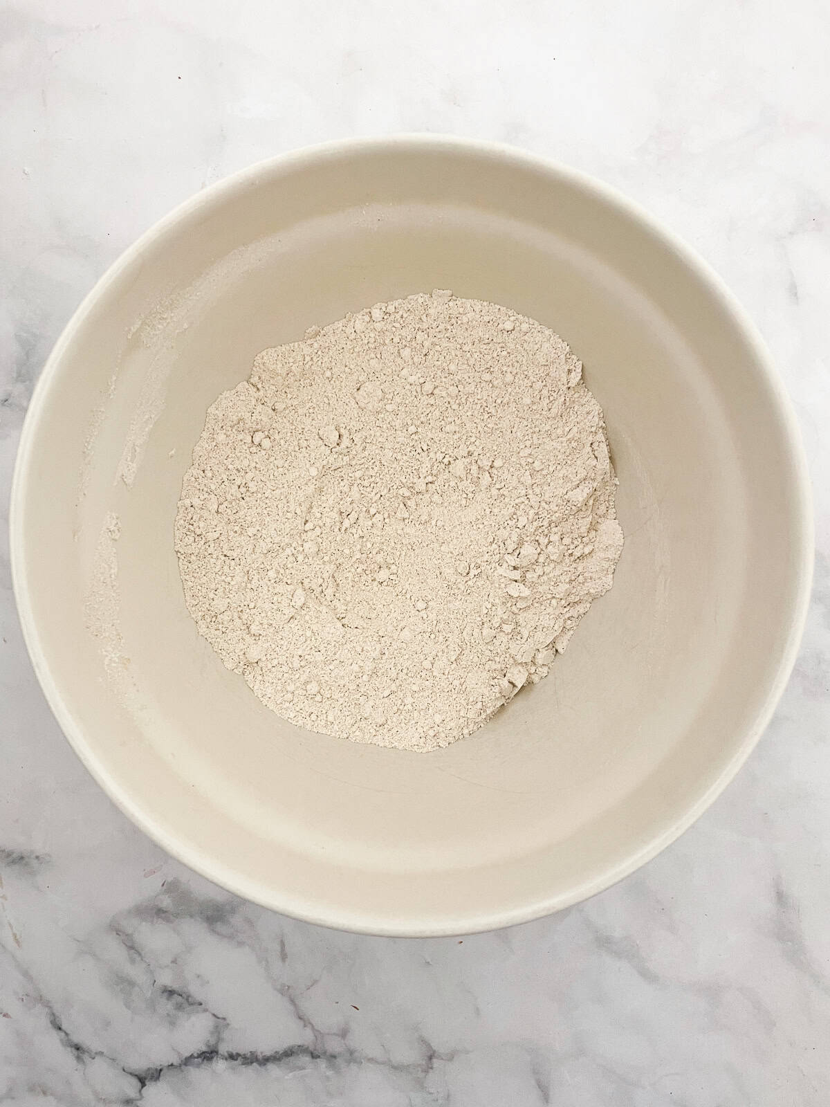 Flour mix for gluten free strawberry muffins in a bowl.