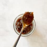 Raspberry rhubarb jam on a spoon.