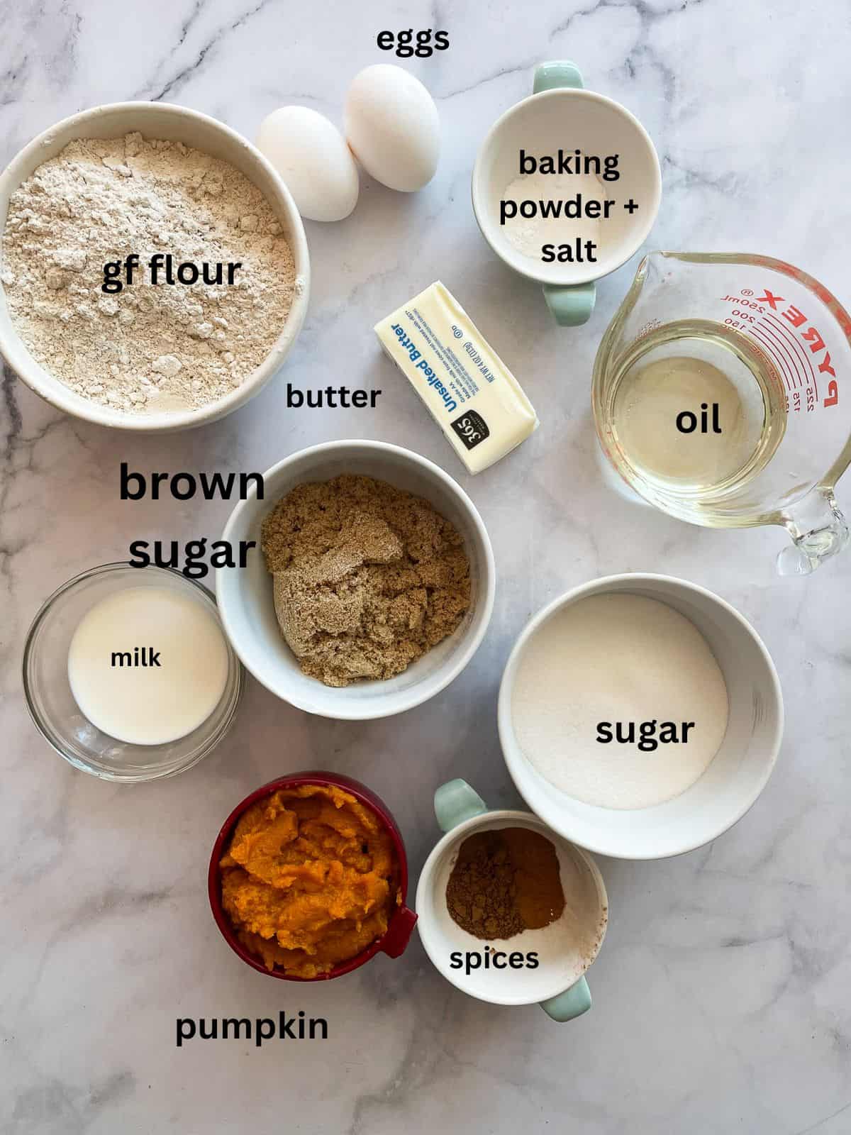 The perfect fall treat, this sweetly spiced and tender gluten free pumpkin coffee cake is topped with a delicious brown sugar streusel. Ingredients for gluten free pumpkin coffee cake are labeled and portioned out.