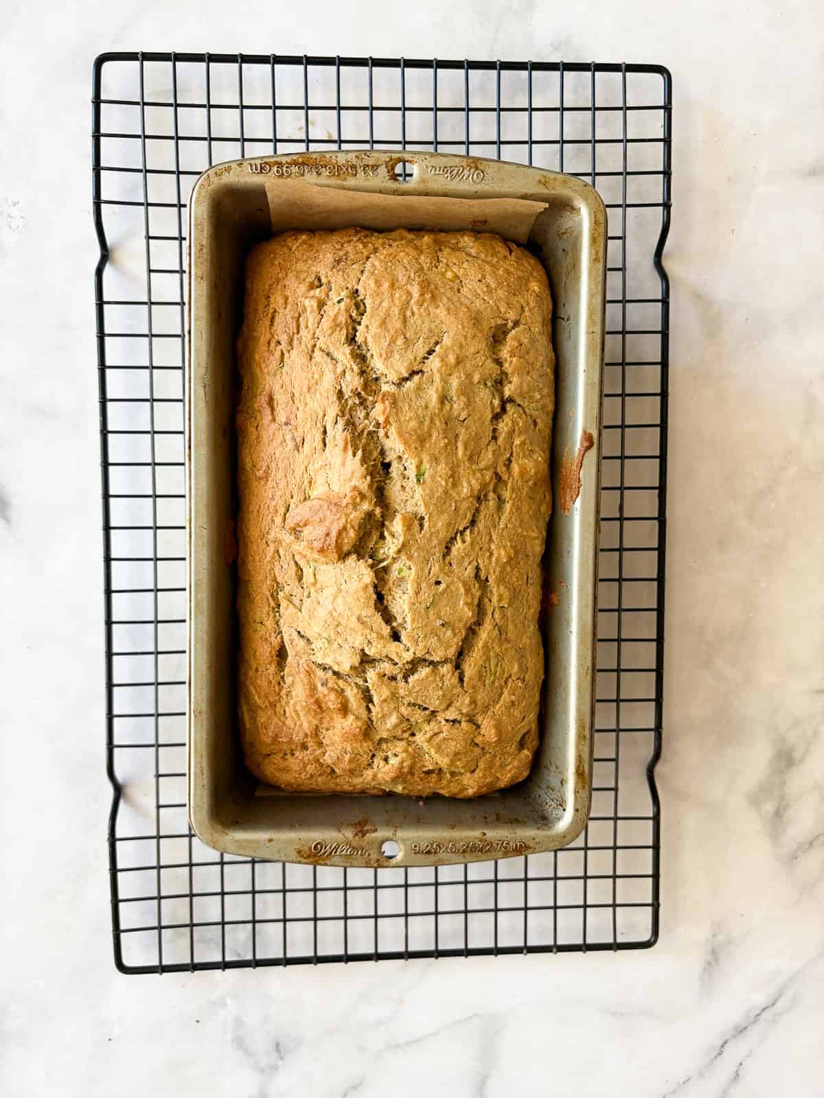 Sweetly simple gluten free banana & zucchini bread is made with whole grain flour and summer's zucchini, plus walnuts for crunch.