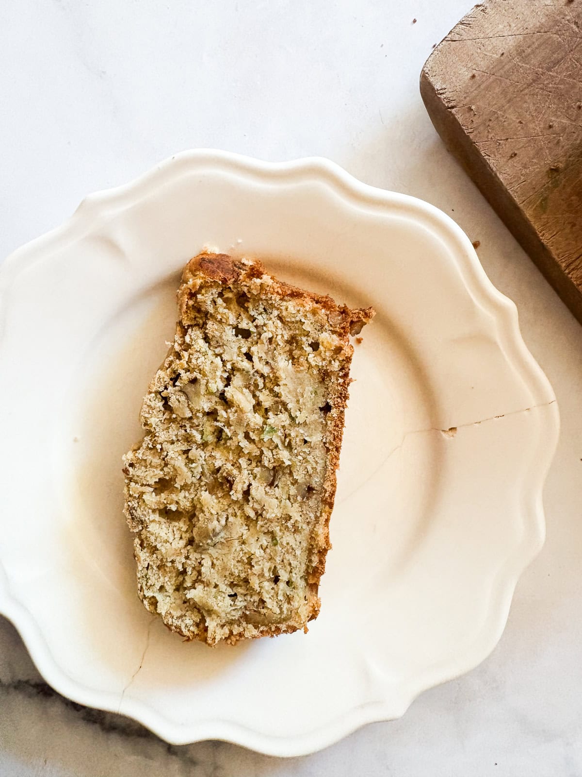 Sweetly simple gluten free banana & zucchini bread is made with whole grain flour and summer's zucchini, plus walnuts for crunch.