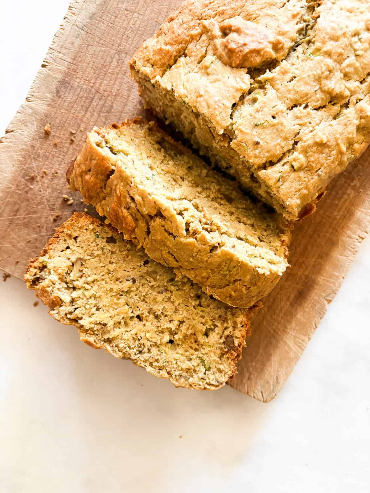 Sweetly simple gluten free banana & zucchini bread is made with whole grain flour and summer's zucchini, plus walnuts for crunch.