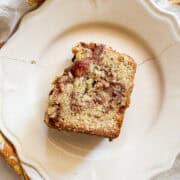 A slice of pear cake on a plate.