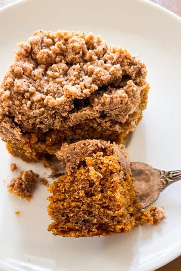 A bite of pumpkin coffee cake on a fork.