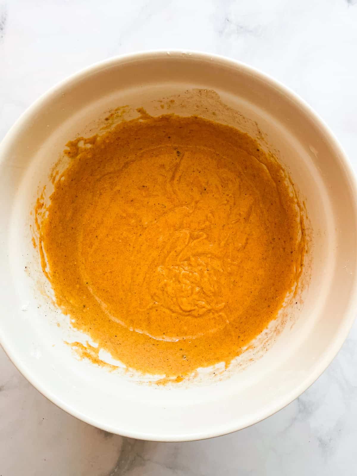 The perfect fall treat, this sweetly spiced and tender gluten free pumpkin coffee cake is topped with a delicious brown sugar streusel. Pumpkin is mixed with eggs for coffee cake.