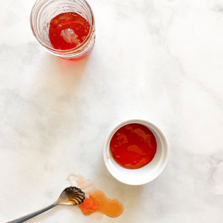 Apple jelly on a counter.