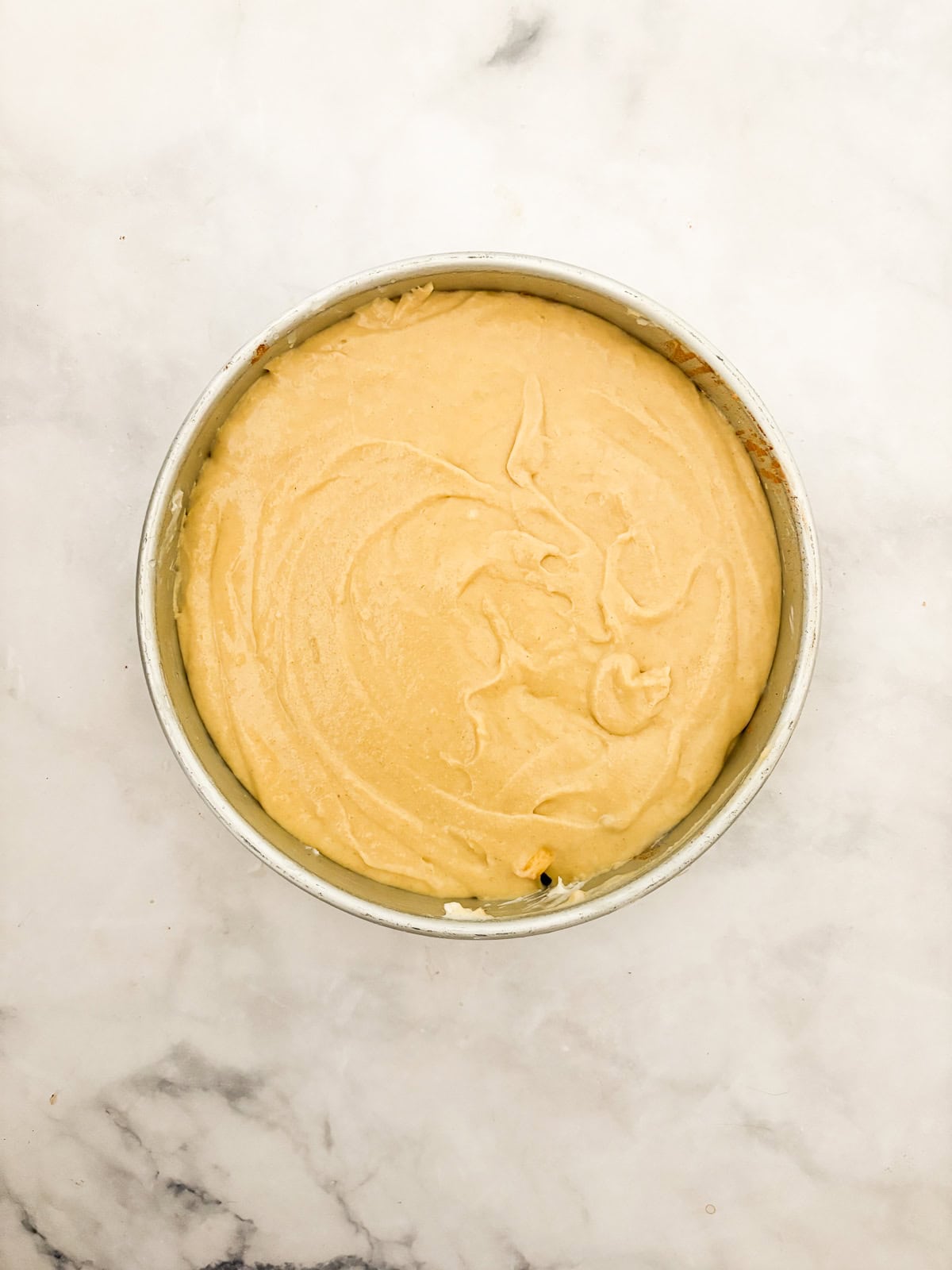 This gluten free nectarine cake is as pretty as it is delicious! Juicy sliced nectarines top a soft and sweet vanilla cake. Batter is added to the fruit slices.