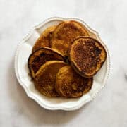 A plate of gluten free pumpkin pancakes.