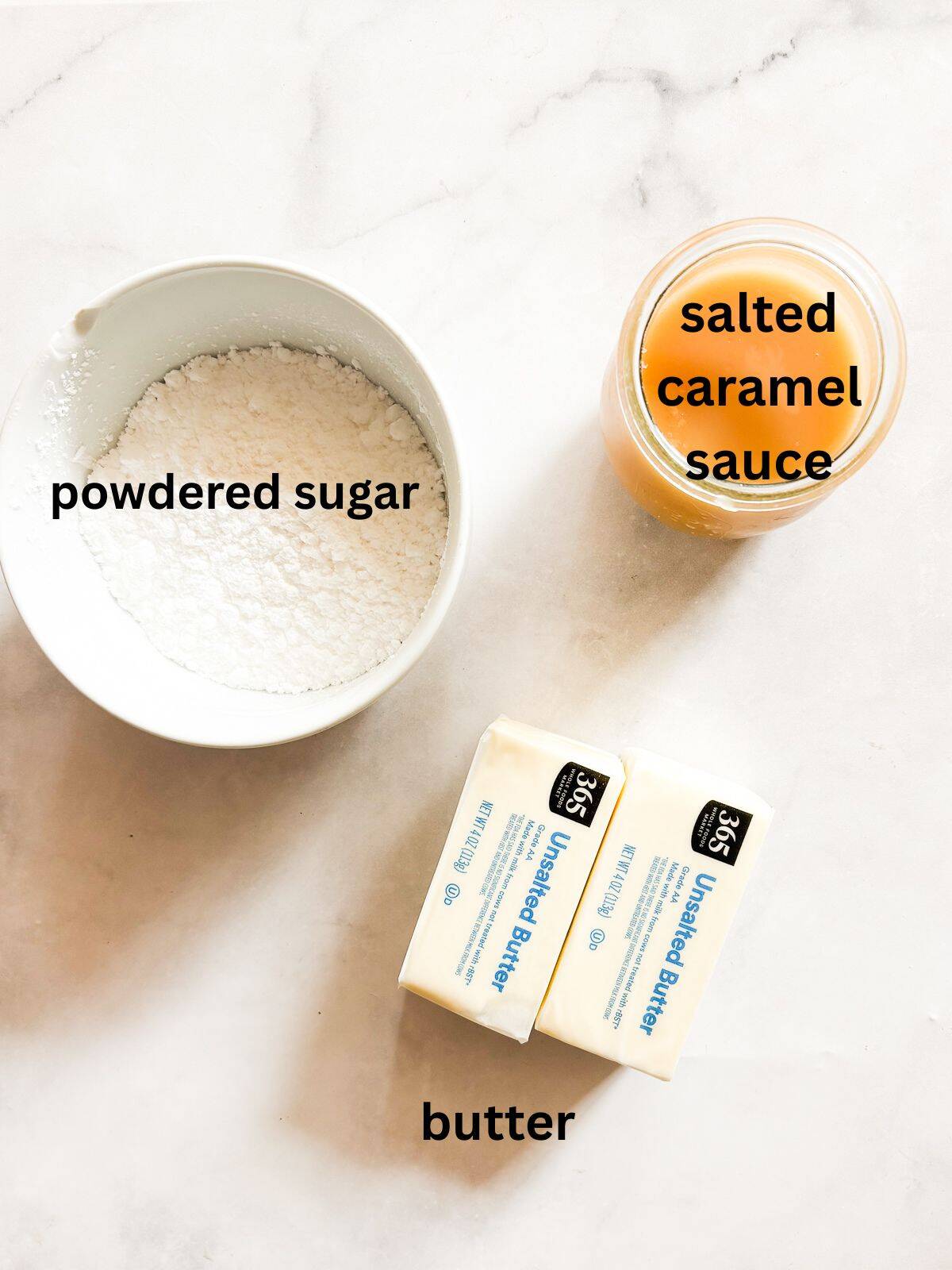 Salted caramel frosting is sweet-salty, creamy, and just fluffy enough. Perfect on everything, from cakes to cupcakes to brownies. Ingredients for salted caramel frosting are labeled.