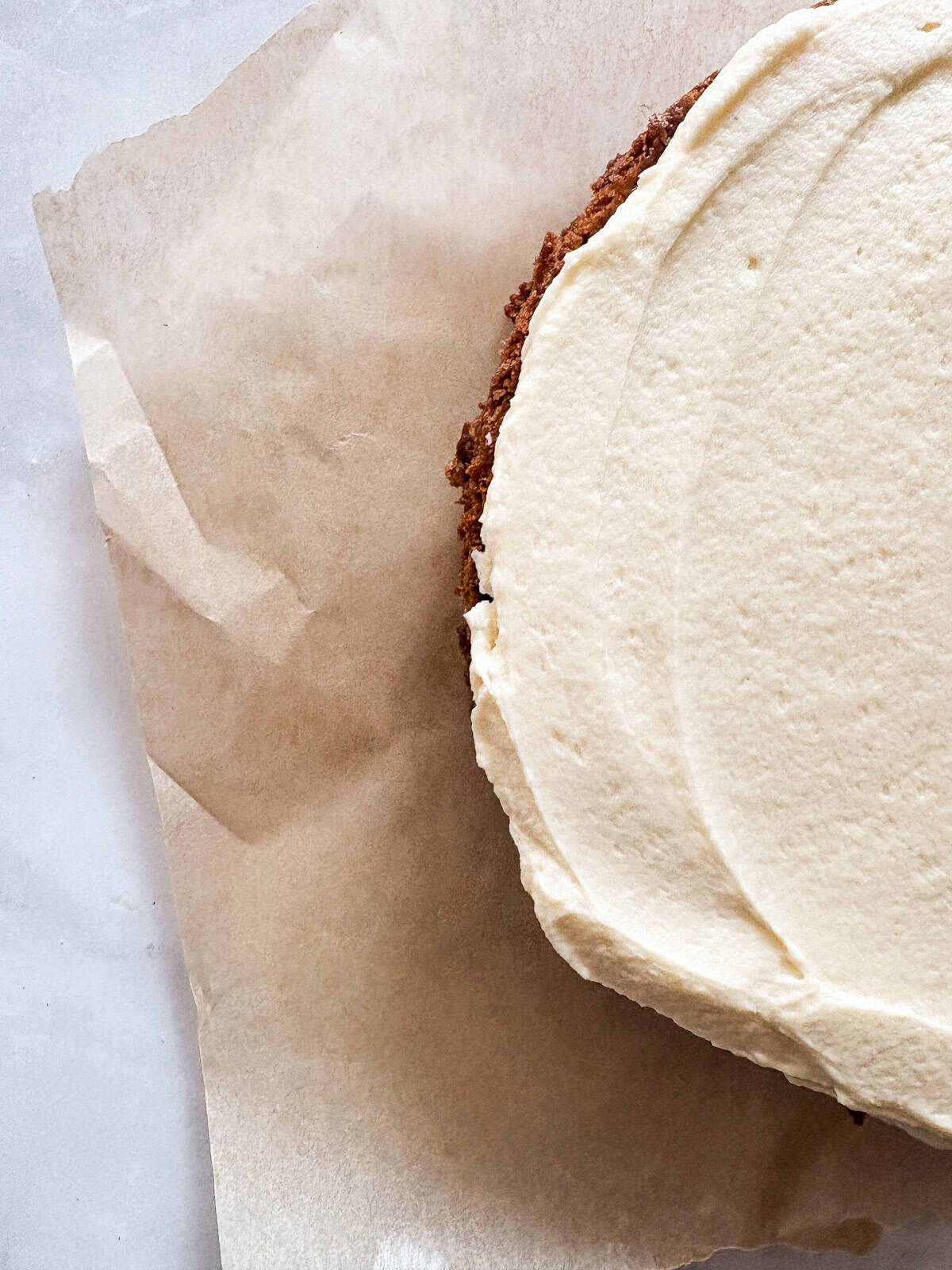 This gluten free chocolate cake with caramel frosting is rich, tender, and deeply chocolatey, perfect for birthdays or any celebration. Salted caramel buttercream tops a gluten free chocolate cake.