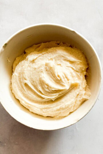 A small bowl of salted caramel frosting.