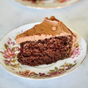 A slice of gluten free chocolate dump cake on a plate.