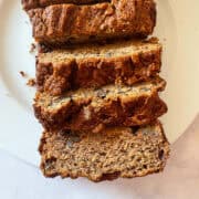 A sliced loaf of gluten free persimmon bread.
