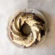 Maple glaze on top of a gluten free persimmon cake.