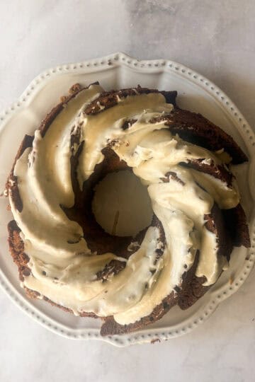 Maple glaze on top of a gluten free persimmon cake.