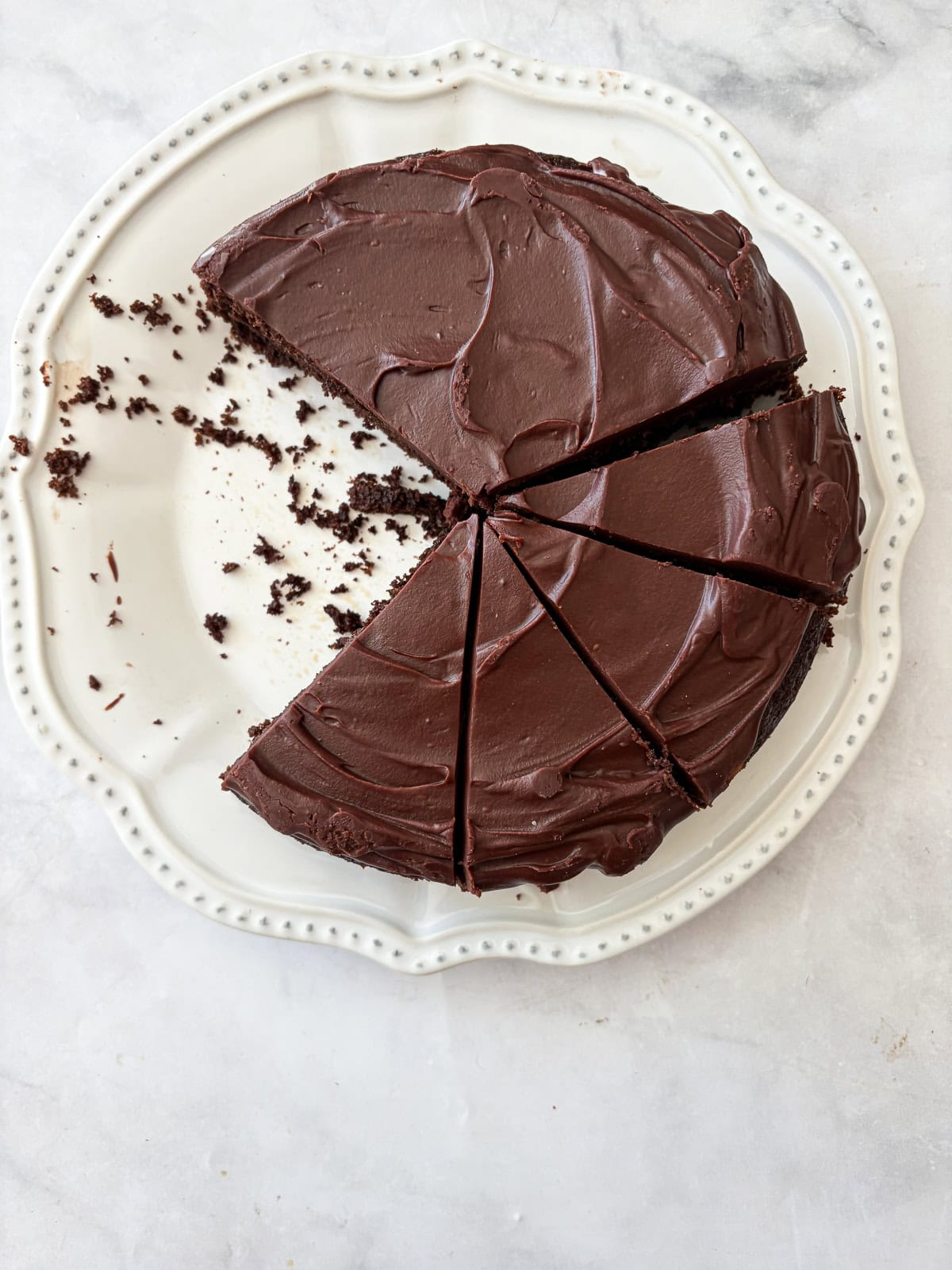 A gluten free olive oil cake sliced.