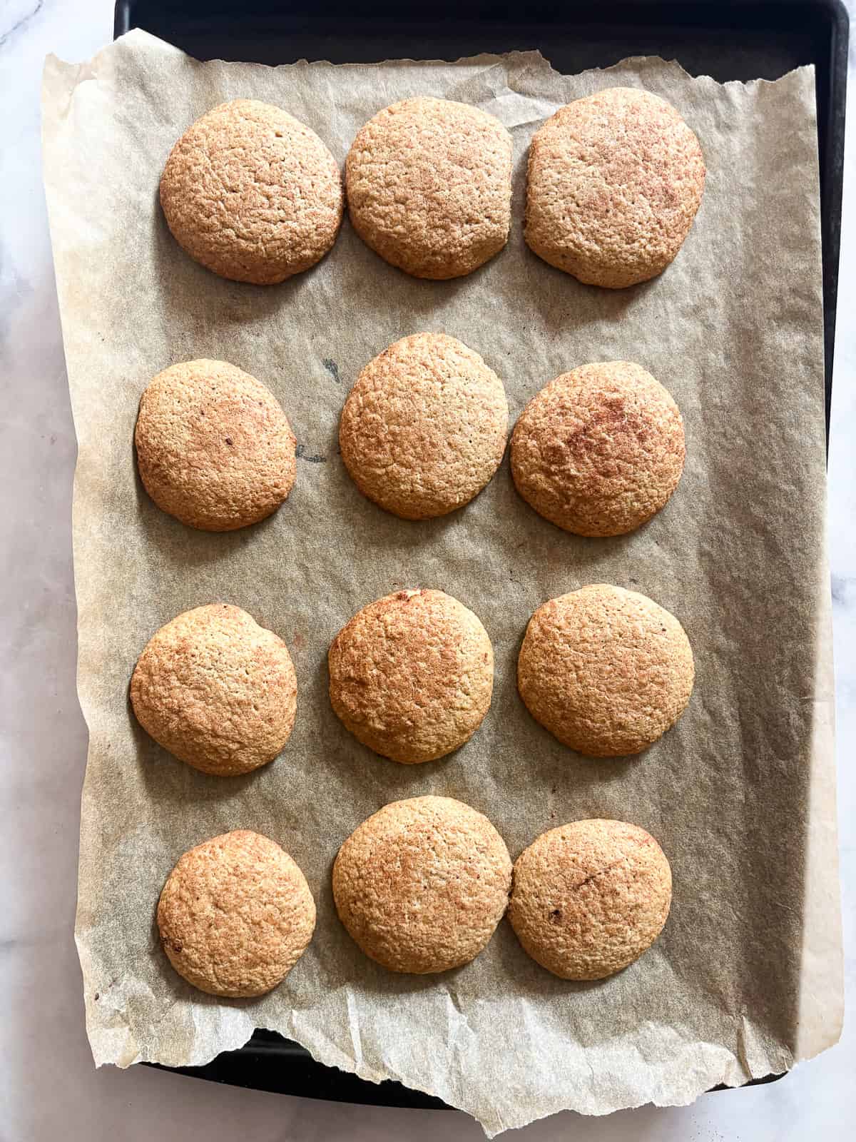 Gluten free snickerdoodles dough after being baked.