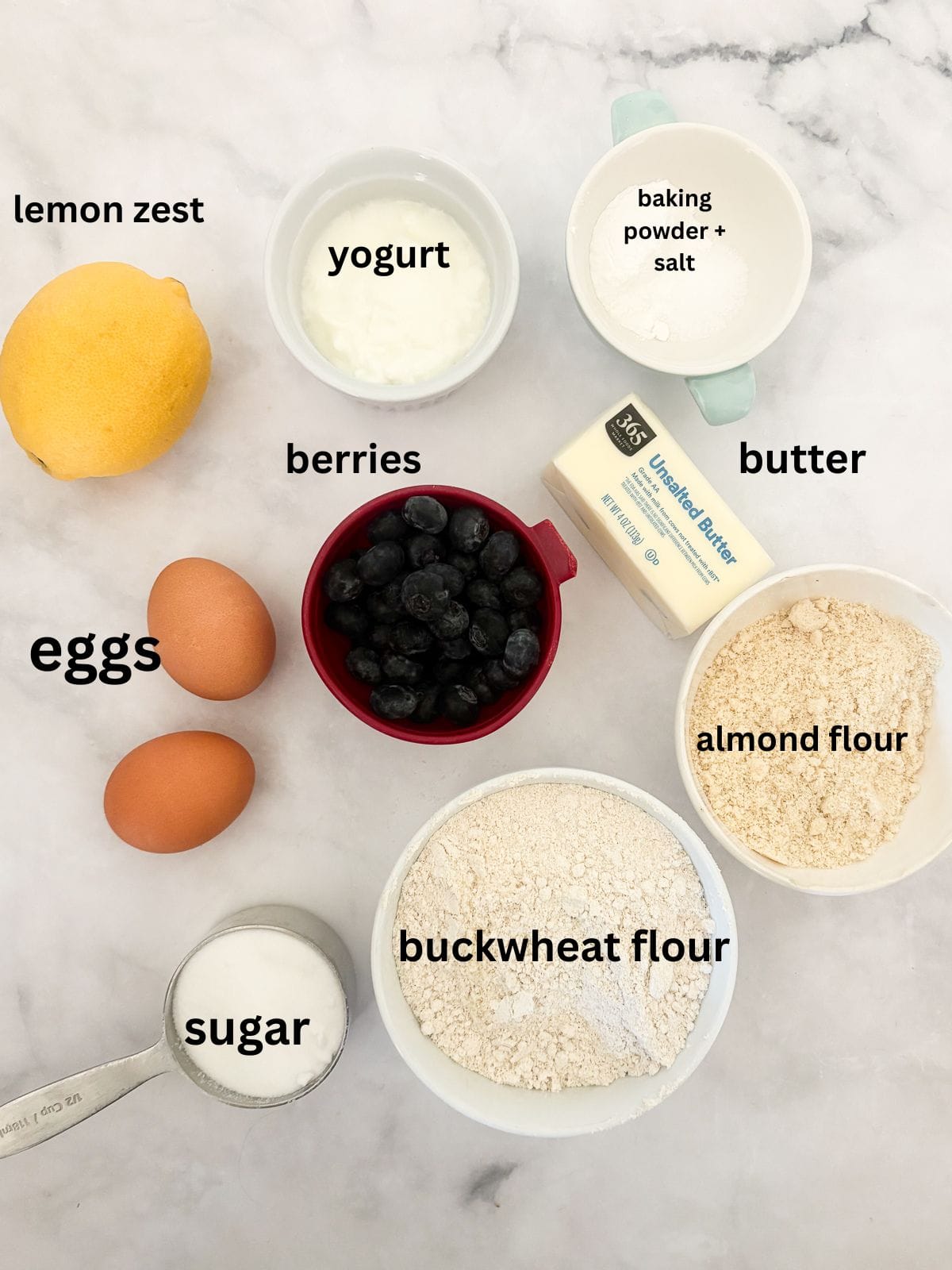 These tender and fluffy gluten free berry buckwheat scones are made with buckwheat and almond flours, yogurt, and fresh or frozen berries. Ingredients for buckwheat scones are text-labeled.